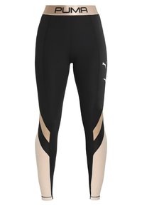 Leggings PUMA con vita alta nera con logo, tessuto principale nero, pannelli laterali di un color beige chiaro e dettagli a taglio.