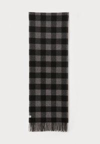 Black and gray checkered scarf with a soft texture, featuring fringed ends and a rectangular shape. Made from warm fabric.