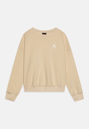 Sudadera beige hecha de algodón suave, con cuello redondo, mangas largas y un pequeño logo blanco de Jordan en el lado izquierdo del pecho.