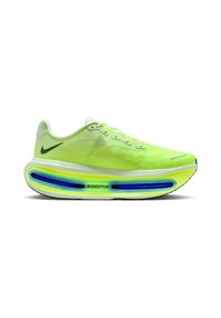 Νεον κίτρινο παπούτσι τρεξίματος Nike με ορατό μπλε αερόσακο ZoomX, μαύρο λογότυπο Nike στη φτέρνα και ελαφρύ επάνω μέρος από πλέγμα.