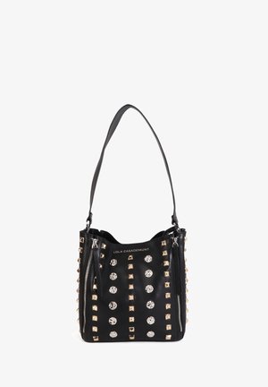Black leather shoulder bag featuring gold and silver studs, a zippered pocket, and a short strap. The front displays a pattern of various studs.