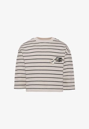 Maglione a cropped bianco e nero a righe con toppe ricamate a forma di macchina fotografica e cuore sul davanti. Tessuto di cotone morbido, vestibilità rilassata, maniche lunghe.