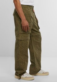 Market MORAINE - Reisitaskuhousut - kelp