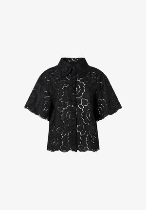 Μαύρο πουκάμισο με κοντά μανίκια, κουμπιά και λουλουδάτο δαντελένιο σχέδιο, με κυματιστό τελείωμα στα μανίκια και στο κάτω μέρος.
