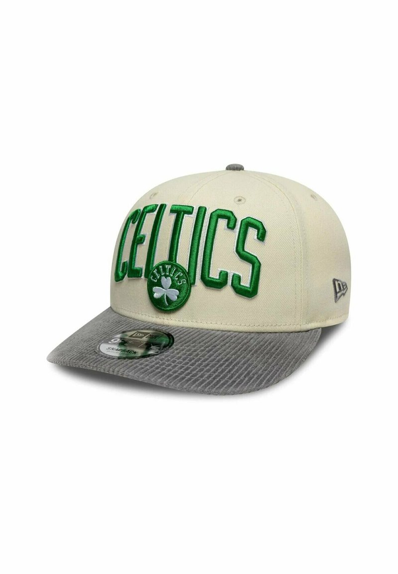 Light beige cap with green "CELTICS" embroidery; round logo with shamrock; textured gray brim; adjustable back strap; sportswear design.