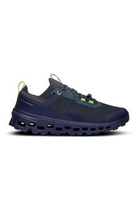 Marinefarbene Mesh-Laufschuhe mit grünen Akzenten, dicke Sohle mit Ausschnitten, verstärkte Ösen und eine Schlaufe an der Ferse für einfaches Anziehen.