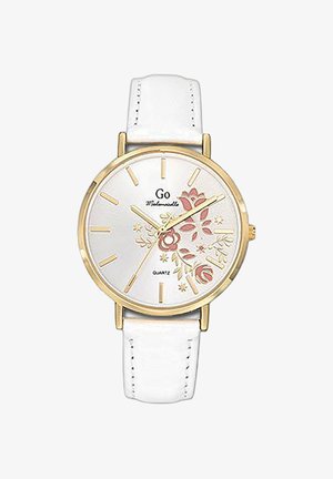 Montre ronde avec un cadran blanc, index d'heure dorés, motifs floraux en rose et vert, montée dans un boîtier doré, dotée d'un bracelet en cuir blanc.