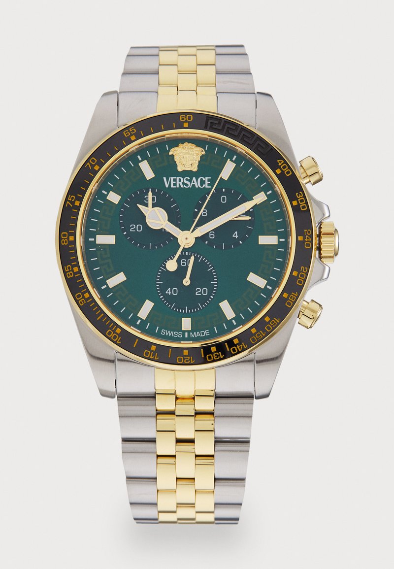 Silver and gold stainless steel chronograph watch with a green dial, featuring three subdials, gold hands, and a Medusa emblem at the 12 o'clock position.