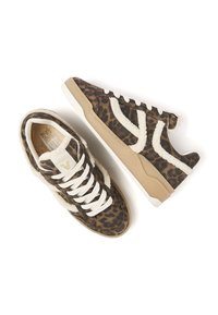 Leopard print sneakers featuring a soft fabric upper, white laces, and beige sole. Accents of faux fur along the sides.
