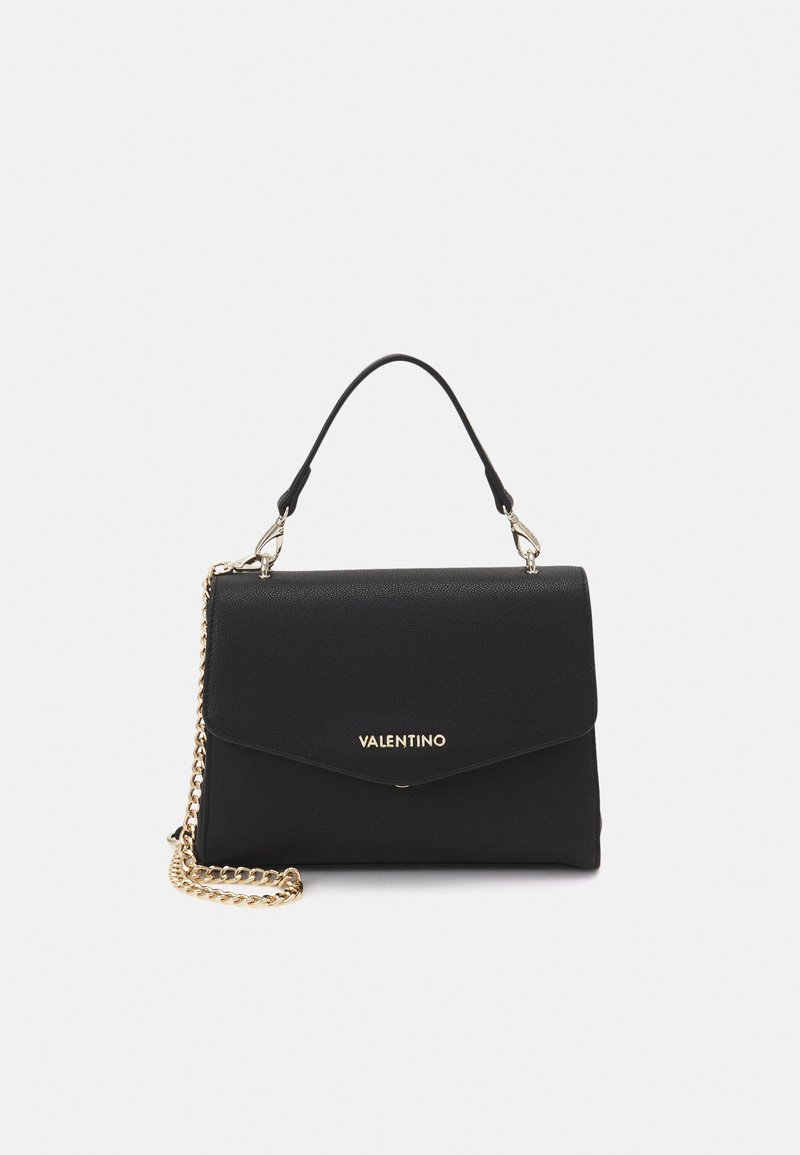 Black Valentino handbag with top handle and gold chain strap, envelope flap, and gold logo centered on front.