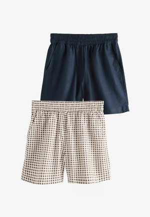 Dos pares de pantalones cortos con cintura elástica, uno azul marino sólido y otro a cuadros marrón y blanco, ambos con bolsillos laterales.
