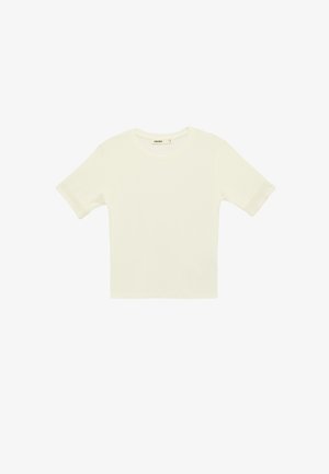 Maglietta a maniche corte color crema in maglia a coste con scollo tondo e polsini ripiegati, mostrata distesa su uno sfondo bianco.
