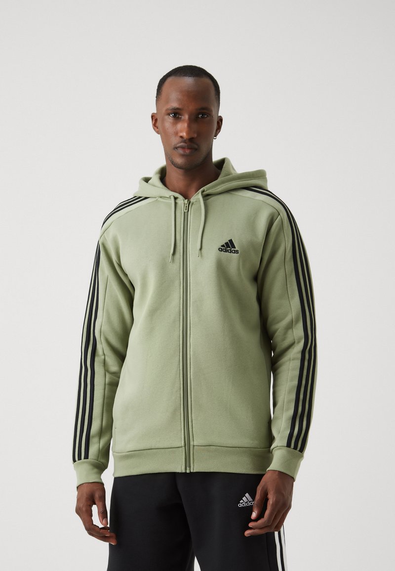 adidas Sportswear ESSENTIALS 3 STRIPES FULL ZIP - Camisola com fecho - tent green/black