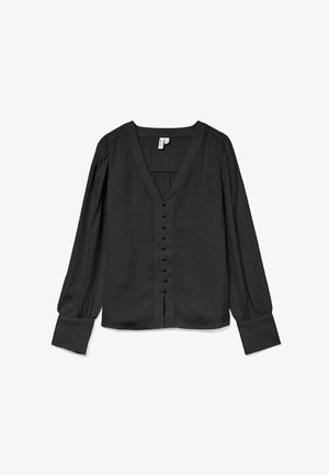 Blouse noire à manches longues avec décolleté en V, dotée de boutons sur le devant, de épaules froncées et de larges poignets. Tissu légèrement texturé.
