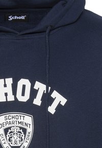 Sudadera azul marino de mezcla de algodón, con un estampado de logo blanco y cordones en el cuello; textura suave y puños acanalados.