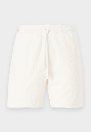 Vita frottéshorts med elastisk midjeband, justerbar dragsko och präglad geometrisk mönster.