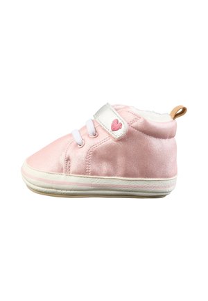 Soft pink baby shoe with white sole, white strap featuring a stitched pink heart, and white laces, shown from the left side.