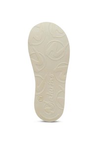 Sottopiedi in gomma crema con motivo testurizzato, caratterizzati da logo circolare e dettagli numerici, superficie liscia e bordi arrotondati.