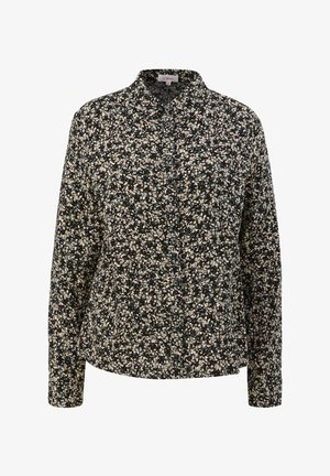 Camicia nera con bottone in cima, caratterizzata da una stampa floreale in tono crema, con colletto classico e maniche lunghe. Realizzata in tessuto leggero.