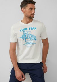 Witte katoenen t-shirt met blauw gedrukte tekst en graphics, ronde halslijn, korte mouwen en een ontspannen pasvorm.