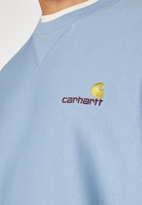 Carhartt WIP AMERICAN SCRIPT - Mikina - frosted blue