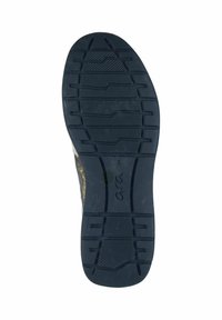 Black rubber shoe sole with textured tread pattern and embossed brand name. Lightweight and flexible design suitable for various terrains.