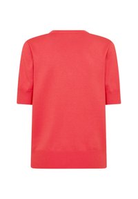Coral-colored short-sleeve sweater with a rounded neckline, smooth texture, and ribbed hem detailing on the bottom and sleeves.