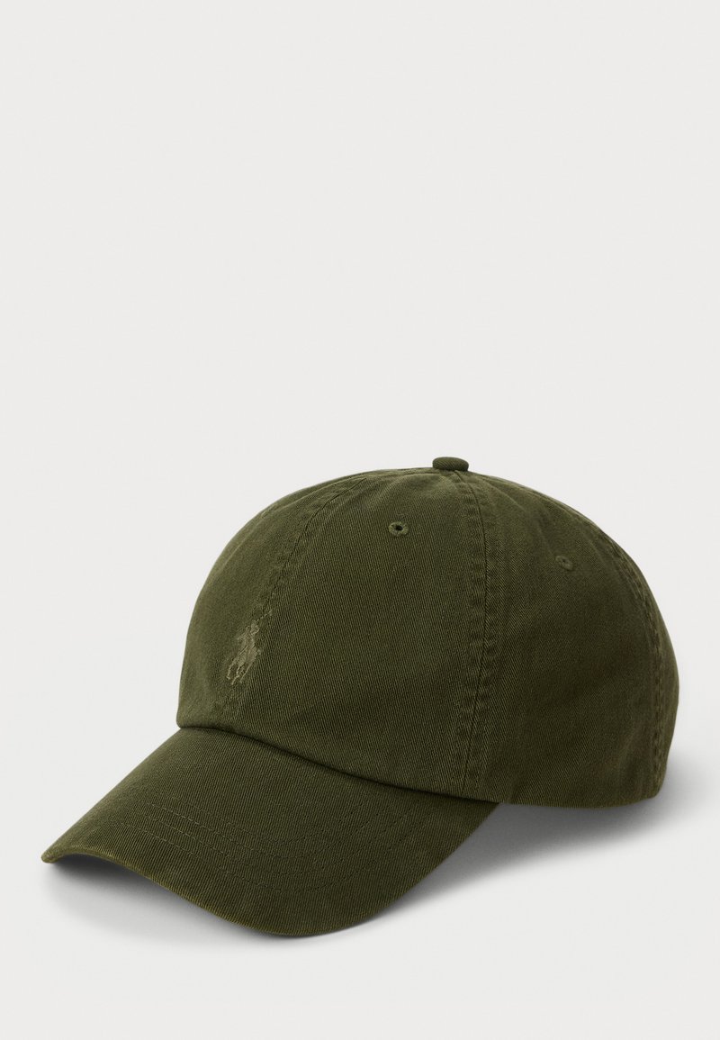 Olive green cotton baseball cap with a curved brim, embroidered logo detail on the front, and adjustable strap at the back.
