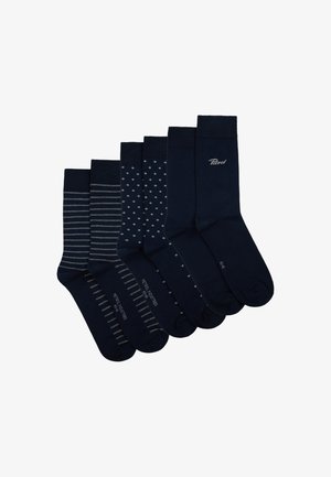 Set di sei calzini navy con diversi motivi: strisce, pois e forme a rombo. Ogni calzino ha una texture liscia con polsini rinforzati.