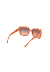 Guess INIETTATO - Aurinkolasit - arancione marrone sfumato