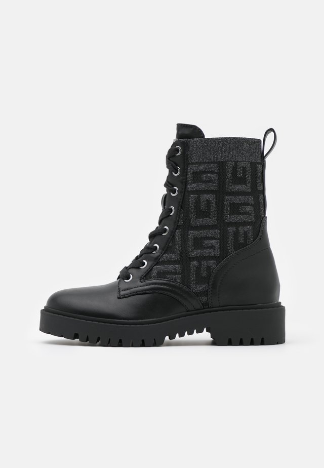 OLINIA - Lace-up ankle boots - black