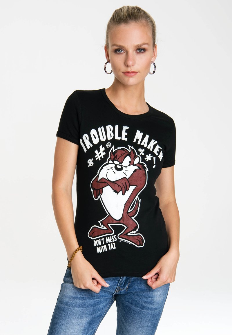 Black t-shirt featuring a cartoon character, a brown Tasmanian devil, with white text that reads "TROUBLE MAKER" and "DON'T MESS WITH TAZ."