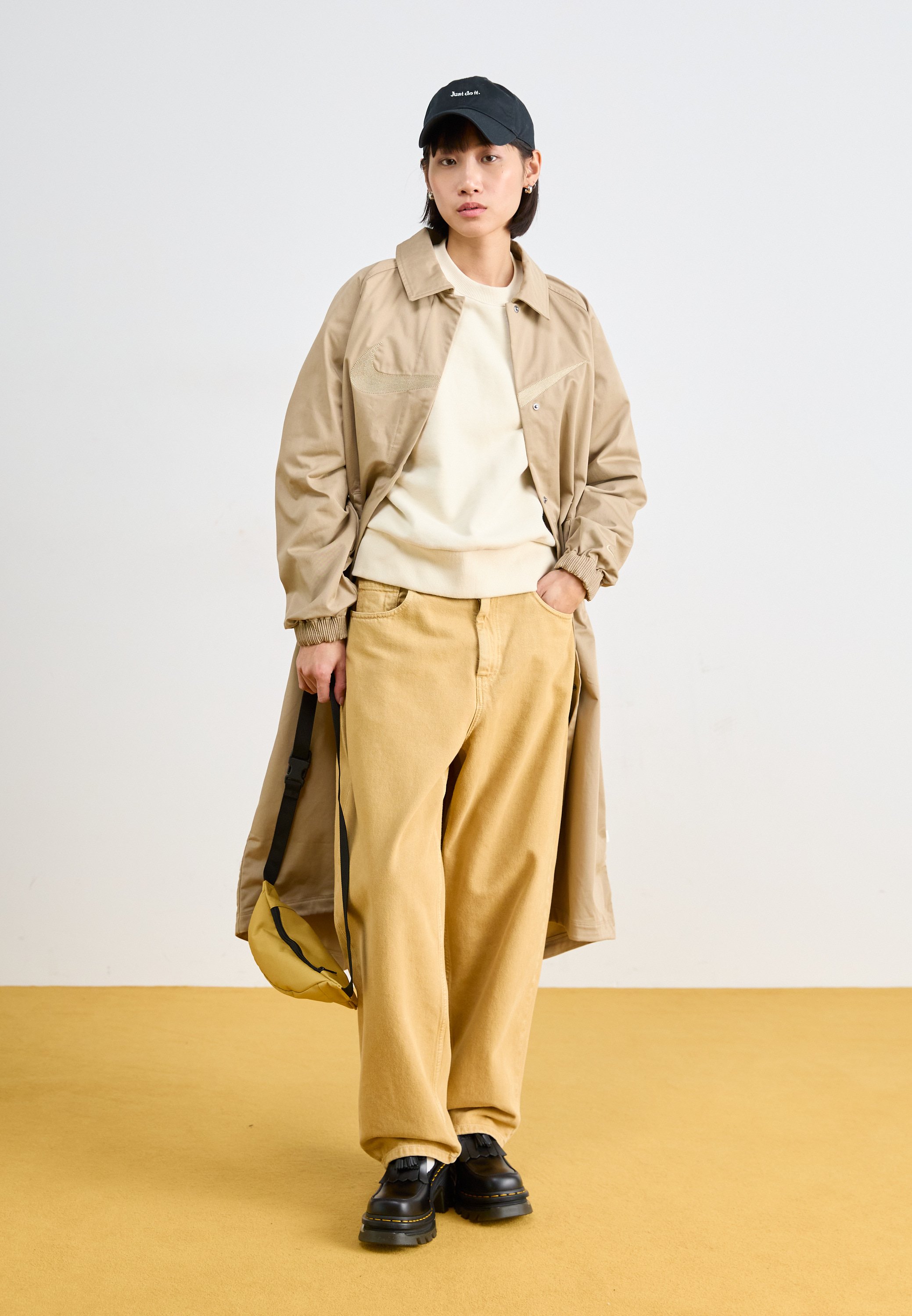 nike trench coat in cream