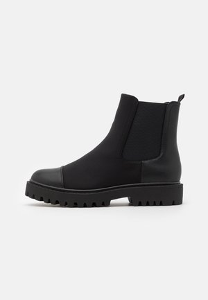 Botines con plataforma - black