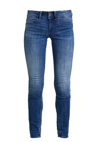 Blå denim skinny jeans med en urtvättad framsida, femficksdesign och knäppning. Tyget har en slät yta.