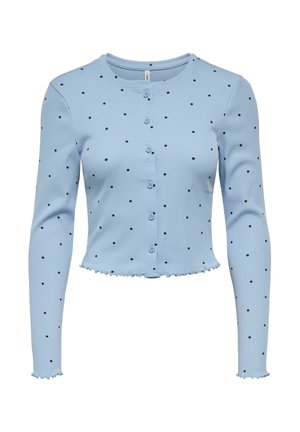 Cardigan bleu clair côtelé à manches longues, orné de pois noirs, avec un col rond et un ourlet à volants. Cinq boutons sur le devant.