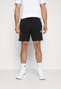 adidas Sportswear - ESSENTIALS FRENCH TERRY 3-STRIPES - Sports shorts - black Thumbnail Image 1