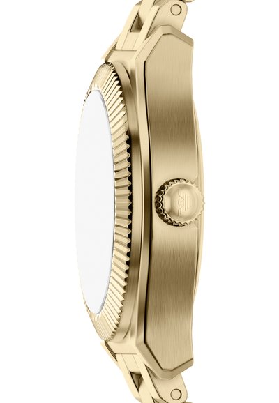 Gold-tone watch featuring a smooth, octagonal case, textured bezel, and a crown with intricate detailing. The dial is blank and unmarked.