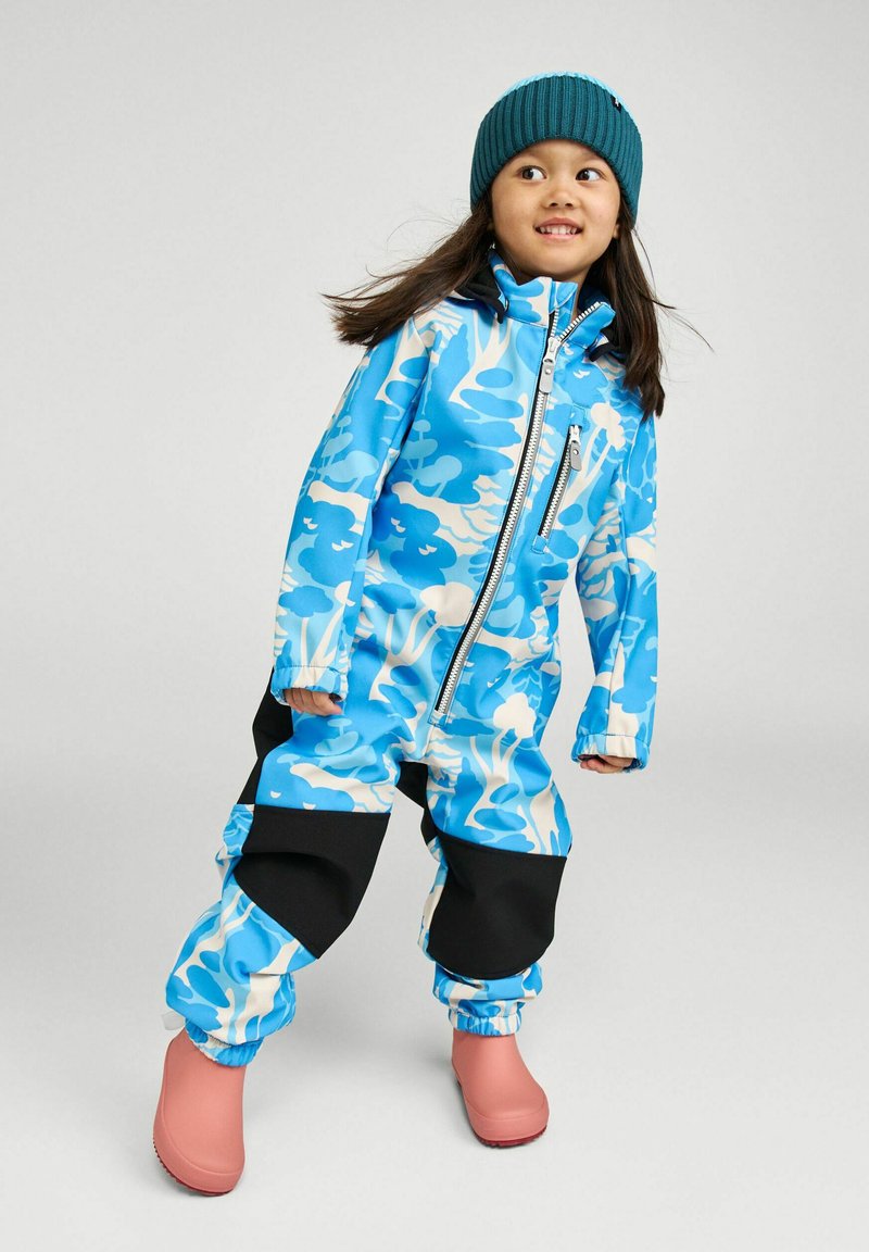 Blue and white patterned waterproof snowsuit with black accents, featuring elastic cuffs, a front zipper, and pink rubber boots.