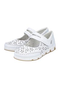 Chaussures en cuir blanc avec un design floral découpé, deux straps ajustables et une semelle rembourrée pour le confort. Semelle extérieure en caoutchouc plate de couleur beige.