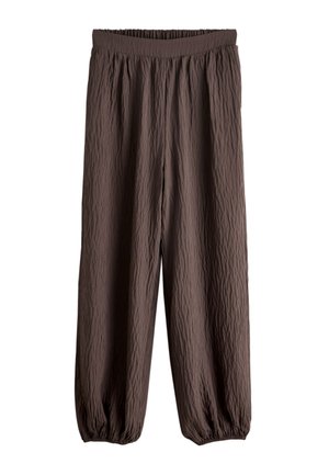 Pantalon ample, brun foncé texturé avec ceinture élastique et poignets élastiques, adapté pour un port décontracté ou relax.