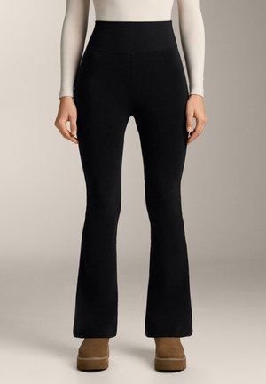 EXTRA WARM SEAMLESS SUPER HIGH RISE FLARE - Pantaloni - black