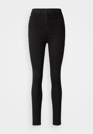 Jean skinny noir taille haute avec bouton frontal, fermeture éclair, passants de ceinture et poches avant sur fond blanc.