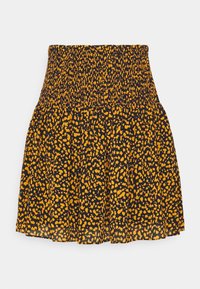 Jupe noire avec des taches jaunes, dotée d'une taille froncée et d'un design plissé, fabriquée en tissu léger.