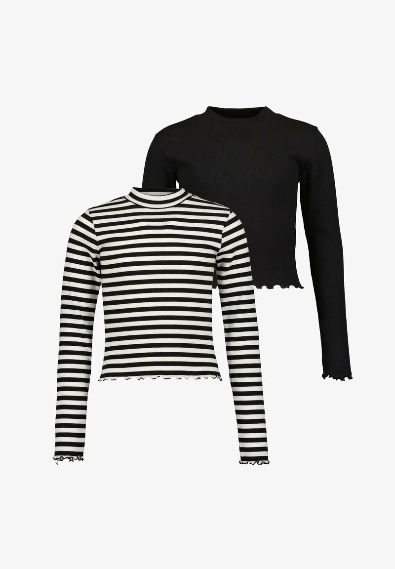 Zwei Langarmoberteile: eines schwarz und eines weiß mit schwarzen Streifen. Beide haben eine gerippte Textur und einen kurzen, fransigen Saum.