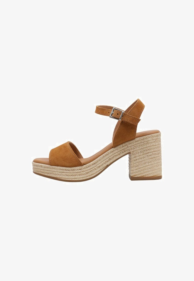 Brown suede block-heeled sandals with an adjustable ankle strap, featuring a woven jute platform and textured detailing on the heel.