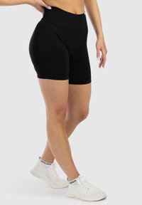 Smilodox EDINA SEAMLESS SCRUNCH - Leggings - schwarz