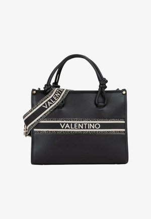 Borsa Valentino nera con due manici e una tracolla staccabile bianca e nera con il logo Valentino.