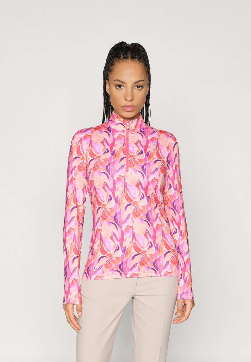 Ilgi piedurkņu, spilgti rozā tops ar ziedu rakstu rozā un purpura toņos, augsts apkakles dizains un priekšējā rāvējslēdzēja detaļa.