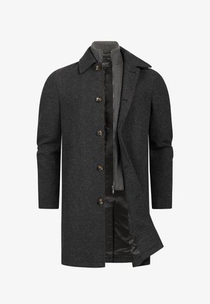 Dunkelgrauer Wollmantel für Herren mit Knopfverschluss, teilweise geöffnet, um das innere gesteppte Futter und den grauen hochgeschlossenen Reißverschluss-Pullover zu zeigen.